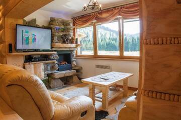 Фото номера Апартаменты с сауной Апартаменты Apartamenty Kiry Zakopane г. Косцелиско 4