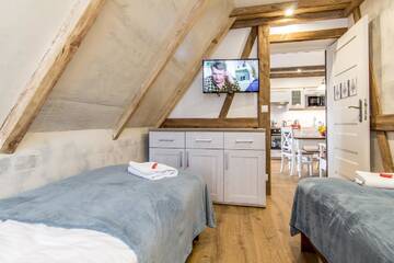 Фото номера Апартаменты с 3 спальнями и балконом Апартаменты Apartamenty Gronik Zakopane г. Косцелиско 28