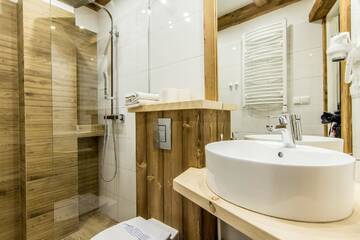 Фото номера Апартаменты с 3 спальнями и балконом Апартаменты Apartamenty Gronik Zakopane г. Косцелиско 12