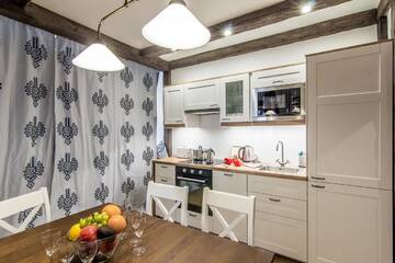 Фото номера Апартаменты с 3 спальнями и балконом Апартаменты Apartamenty Gronik Zakopane г. Косцелиско 20