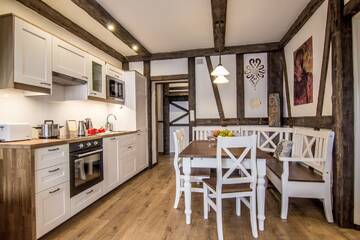 Фото номера Апартаменты с 3 спальнями и балконом Апартаменты Apartamenty Gronik Zakopane г. Косцелиско 6
