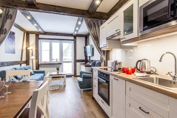 Фото номера Апартаменты с 3 спальнями и балконом Апартаменты Apartamenty Gronik Zakopane г. Косцелиско 25