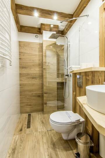 Фото номера Апартаменты с 3 спальнями и балконом Апартаменты Apartamenty Gronik Zakopane г. Косцелиско 7