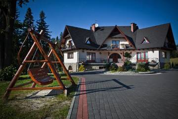 Фото Апартаменты Sykowny Dworek Apartamenty г. Косцелиско 2