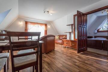 Фото номера Семейные апартаменты Апартаменты Sykowny Dworek Apartamenty г. Косцелиско 45