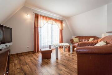 Фото номера Семейные апартаменты Апартаменты Sykowny Dworek Apartamenty г. Косцелиско 20