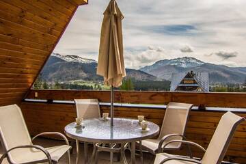 Фото номера Апартаменты с видом на горы (для 4 взрослых) Апартаменты Apartamenty Snowbird Zakopane г. Косцелиско 23