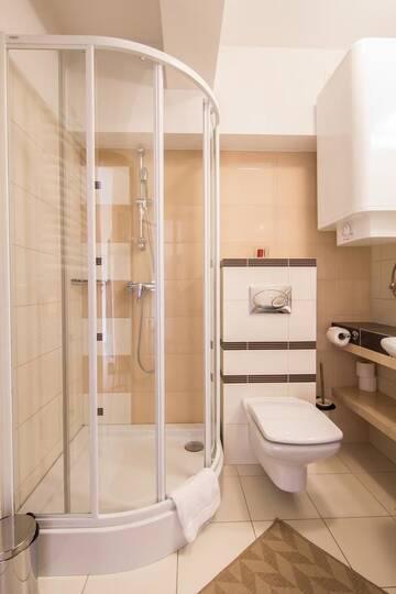 Фото номера Апартаменты с видом на горы (для 4 взрослых) Апартаменты Apartamenty Snowbird Zakopane г. Косцелиско 10