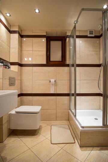Фото номера Апартаменты - 1-й этаж Апартаменты Sentymentalne Kościelisko Apartament &amp; SPA г. Косцелиско 27
