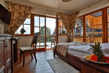 Фото номера Апартаменты (для 3 взрослых) Апарт-отели Butorowy Dwór г. Косцелиско 6