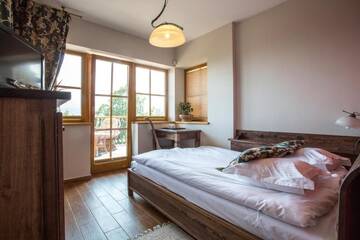 Фото номера Двухместный номер с 1 кроватью Апарт-отели Butorowy Dwór г. Косцелиско 6