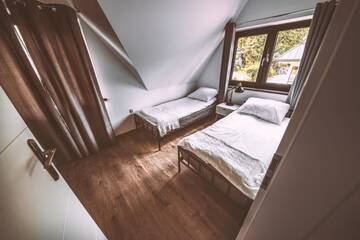 Фото номера Дом с 2 спальнями Дома для отпуска ARKA HOUSE DOMEK WIDOKOWY г. Косцелиско 50