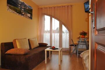 Фото номера Studio Apartment with Terrace and Fireplace and Mountain View Апартаменты Apartamenty Carpe Diem г. Косцелиско 10