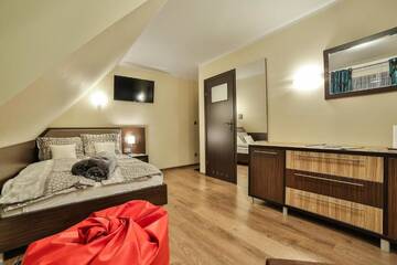 Фото номера Четырехместный номер с видом на горы Апарт-отели Apartamenty Kościelisko г. Косцелиско 7