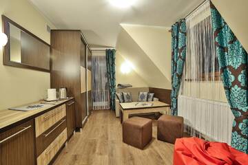 Фото номера Четырехместный номер с видом на горы Апарт-отели Apartamenty Kościelisko г. Косцелиско 3