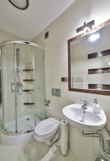 Фото номера Четырехместный номер с видом на горы Апарт-отели Apartamenty Kościelisko г. Косцелиско 5