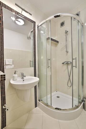 Фото номера Четырехместный номер Делюкс Апарт-отели Apartamenty Kościelisko г. Косцелиско 3
