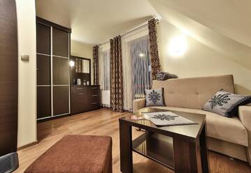 Фото номера Четырехместный номер Делюкс Апарт-отели Apartamenty Kościelisko г. Косцелиско 2