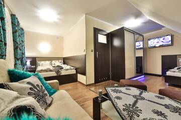 Фото номера Семейный номер с видом на горы Апарт-отели Apartamenty Kościelisko г. Косцелиско 5