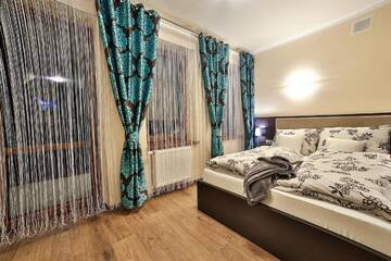 Фото номера Семейный номер с видом на горы Апарт-отели Apartamenty Kościelisko г. Косцелиско 3