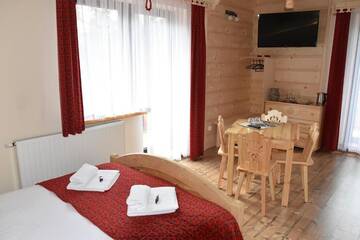 Фото номера Номер Делюкс с террасой Отели типа «постель и завтрак» Czerwone Korale - Natural House - Wypoczynek dla Dorosłych г. Косцелиско 5