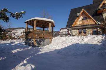 Фото номера Шале с двумя спальнями Шале Alpejski domek na Wierchu г. Косцелиско 44